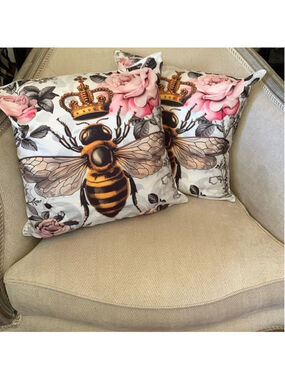 Two queen bee cushion covers with flowers and zippers